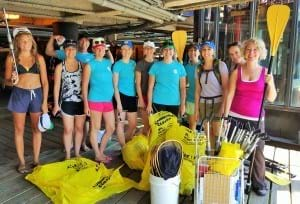 WE volunteers group picture before they head onto water