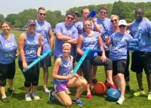 WE volunteers pose for a group picture after kickball tournament 