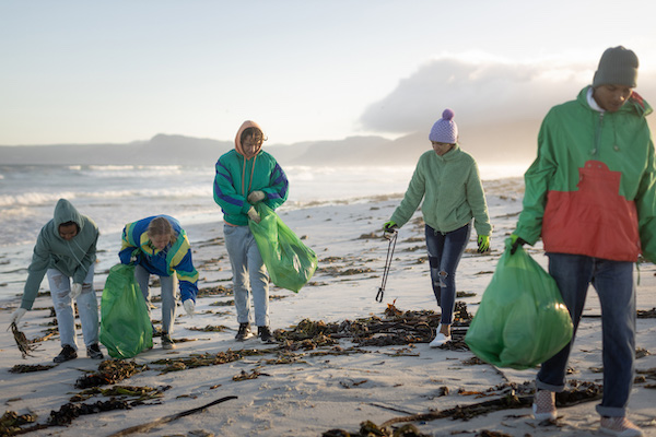 People picking rubbish at beach